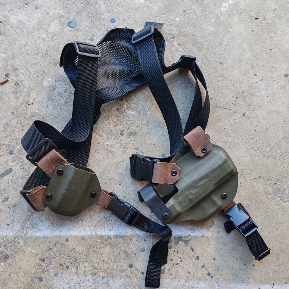 Shoulder holster rig laid flat